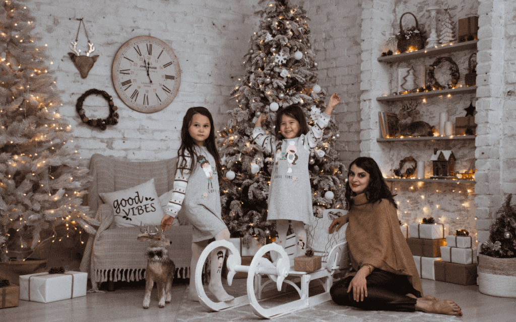 a happy family with a decorative Christmas decoration in their living room