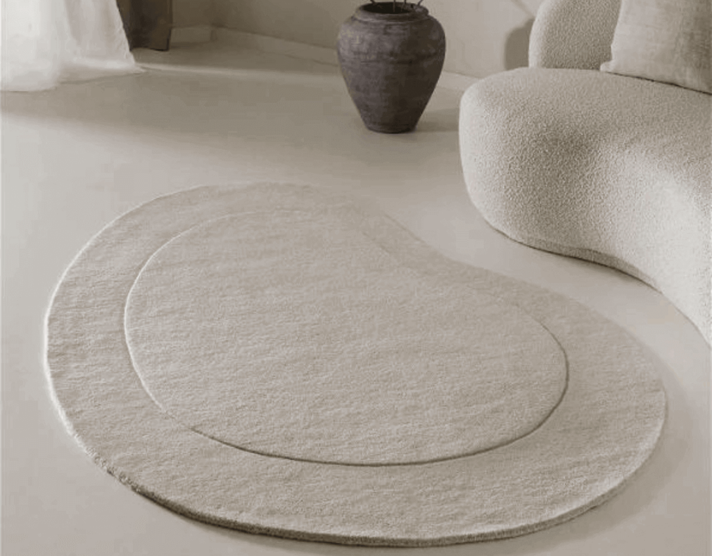 a minimalist rug in the floor