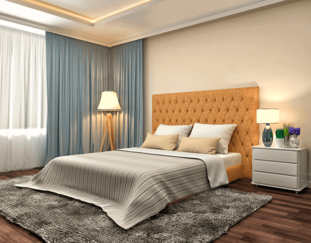 A bedroom featuring blue-green silk curtains, a gray carpet, and a floor lamp for a soothing ambiance.