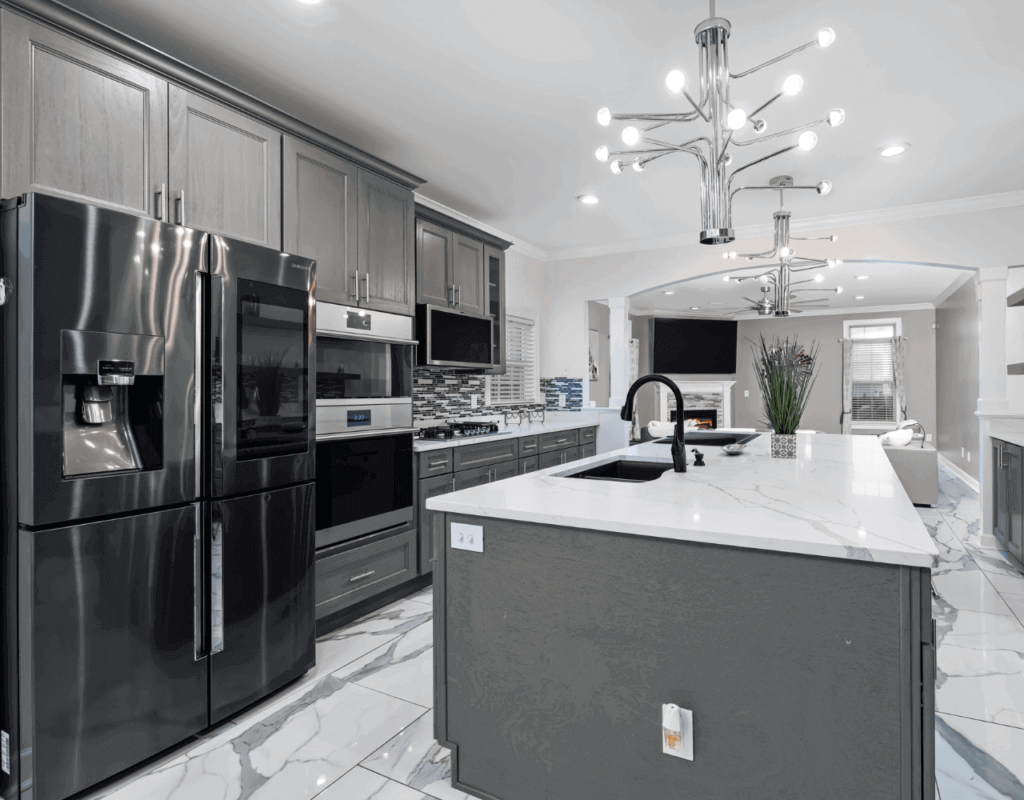 A top class kitchen appliances with a ceiling light and an island counter