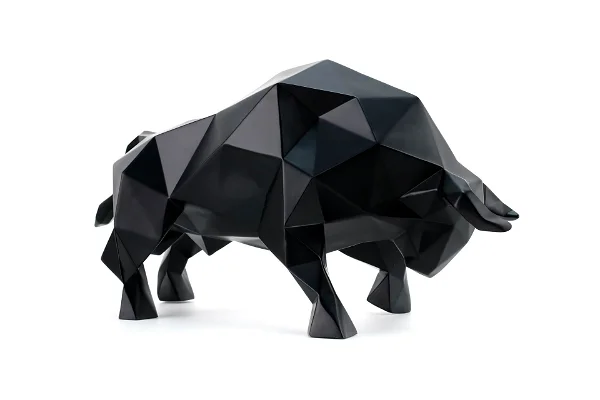 A black bull sculpture in white background