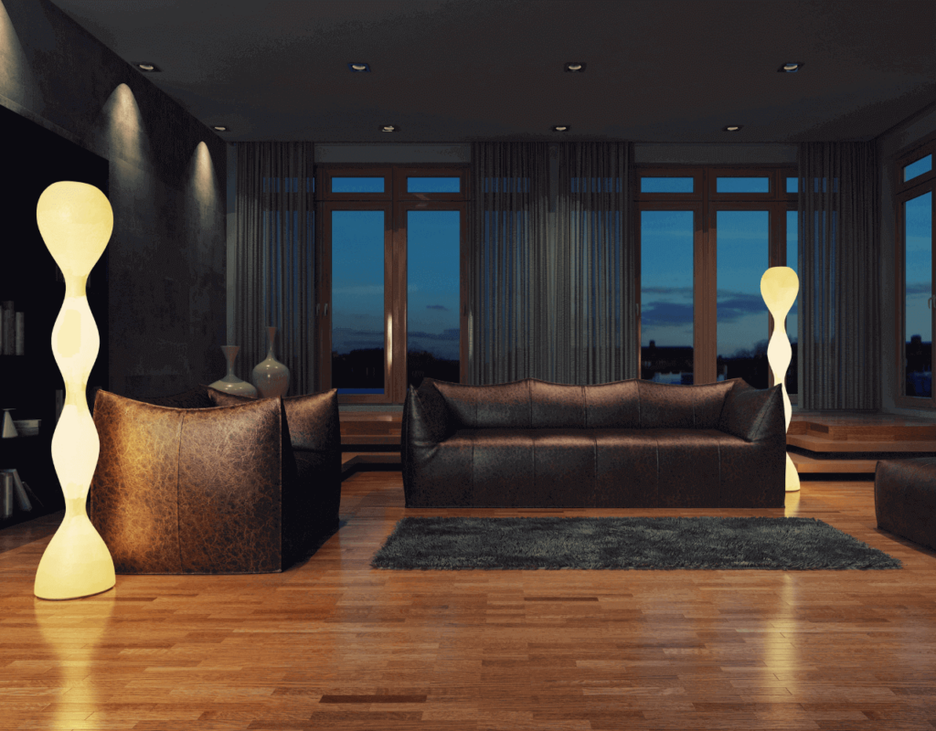 Black leather sofa with a floor lamp