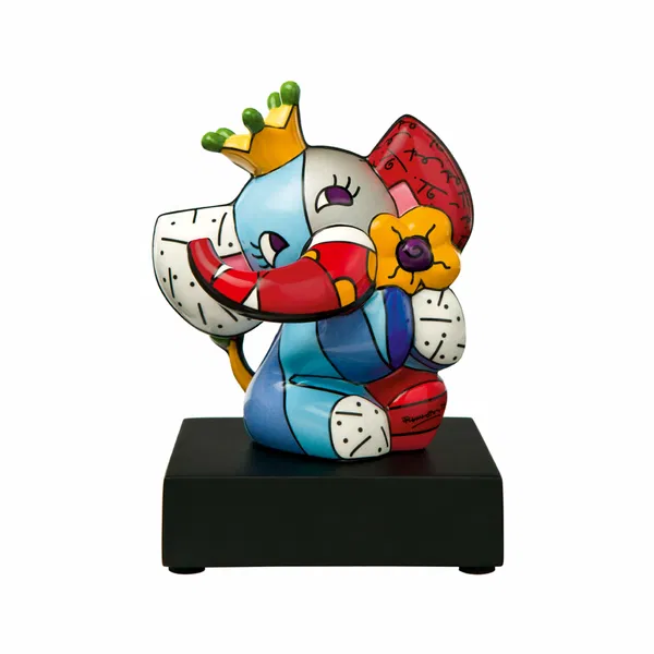 Charming porcelain flower sculpture symbolizing friendship, with bright, cheerful colors and a whimsical design.
