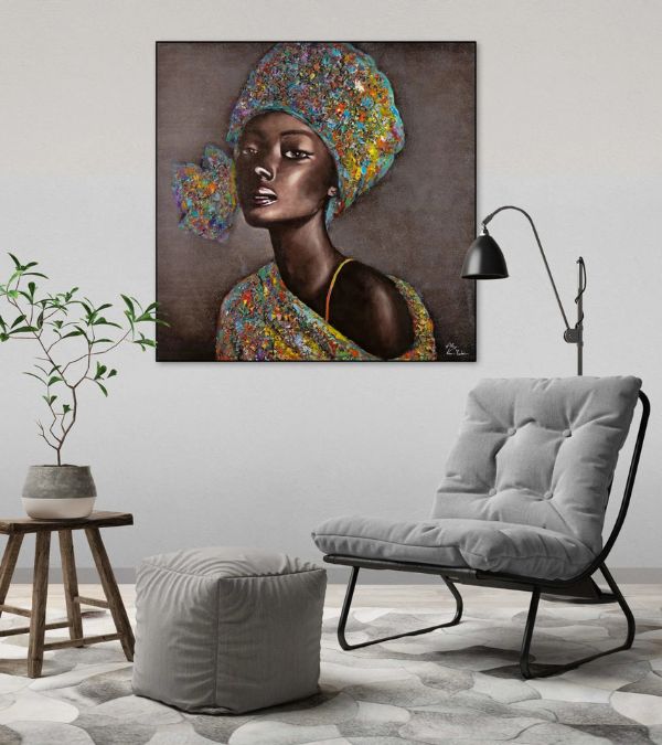 A modern living room mockup showcasing a large portrait canvas titled "Beauty of Youth" featuring a woman in an elegant patterned headscarf.