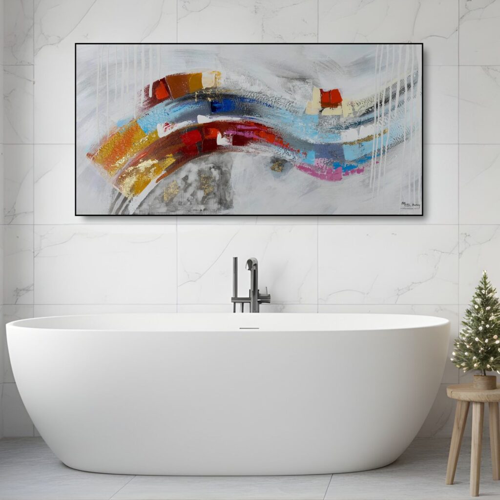 A horizontal abstract painting with a sweeping "S" curve of rainbow colors, displayed in a modern bathroom above a white freestanding bathtub.