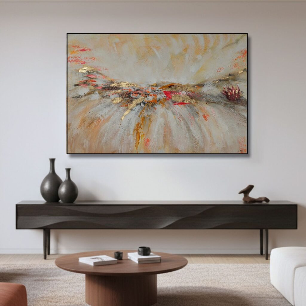 A large, textured abstract painting with soft beige, grey, and hints of red, displayed in a minimalist living room above a dark wood sideboard.